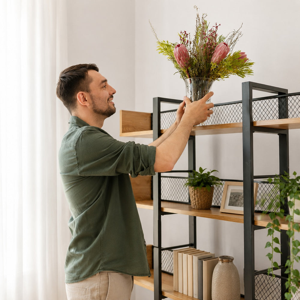 Fresh flowers and sculptural accents bring personality to thoughtfully arranged everyday spaces.